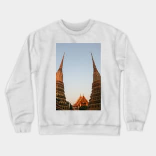 Part view from two stupa against clear sky at Wat Pho Buddha temple. Crewneck Sweatshirt